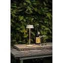 Konstsmide Lámpara de mesa a pilas MENTON USB IP54, color arenoso, barnizado regulable
