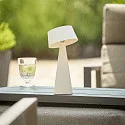 SIGOR Lámpara de mesa a pilas SOLINO IP44, blancanieves regulable